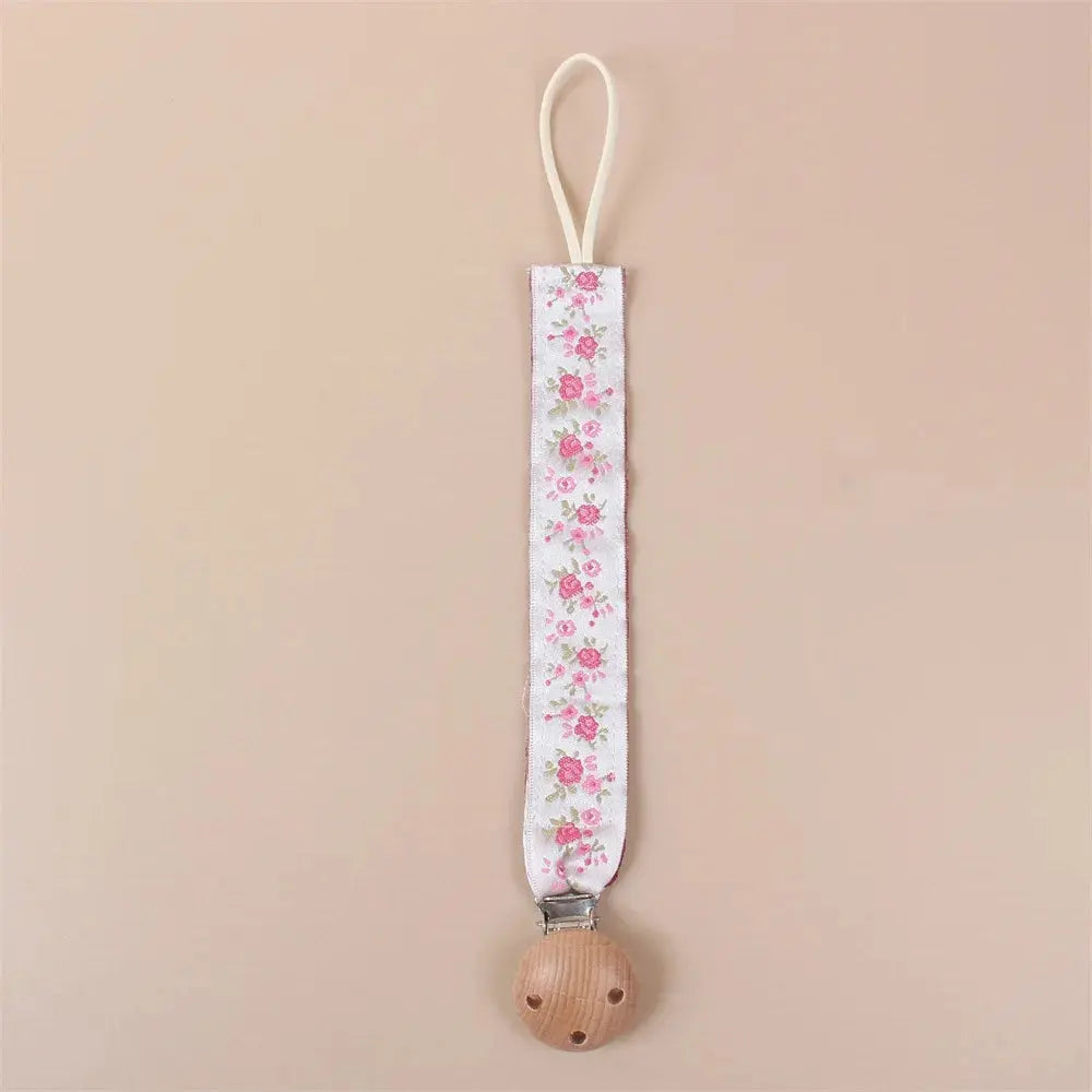 Attache tétine en tissu floral avec clip en bois