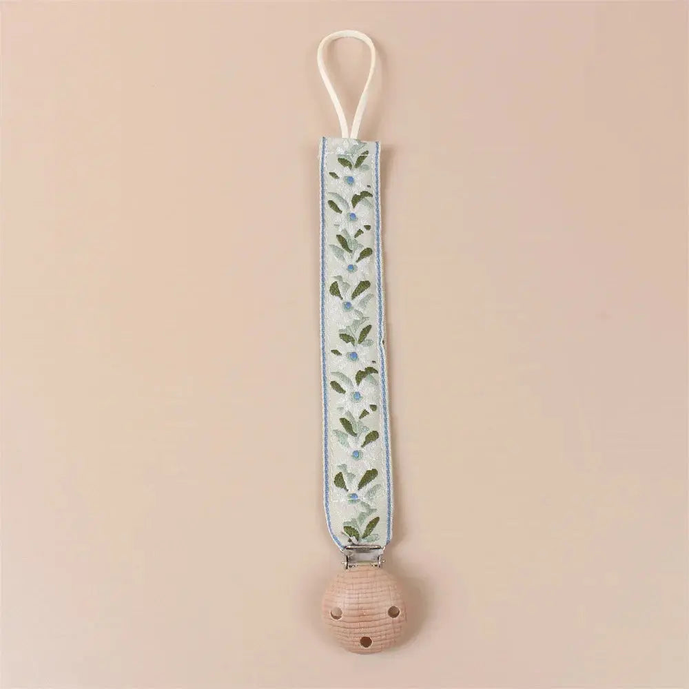 Attache tétine en tissu floral avec clip en bois